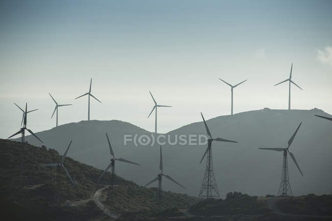 Spain, Andalusia, Tarifa, Wind farm on hills — Stock Photo