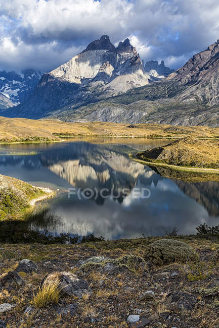 Chile, Torres del Paine National Park, Cordillera del Paine and hill on ...