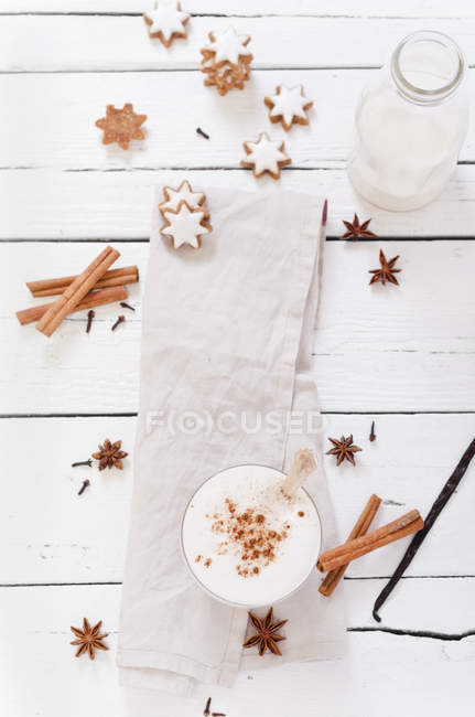 Chai Latte with ingredients and cookies — Stock Photo