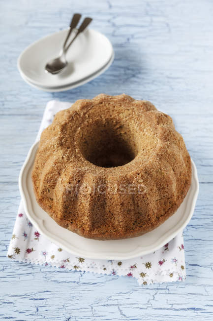 Zucchini nut cake on a wooden table — Stock Photo