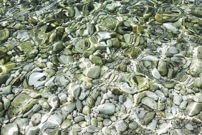 Croatia, Mediterranean Sea, ocean, pebbles at the ground — Stock Photo