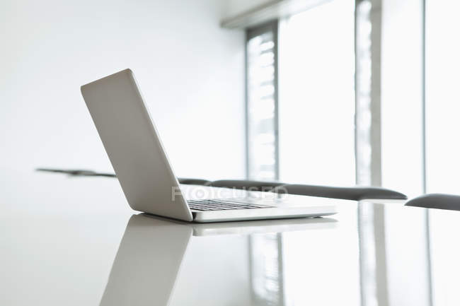 Close up of opened  Laptop on conference table — Stock Photo
