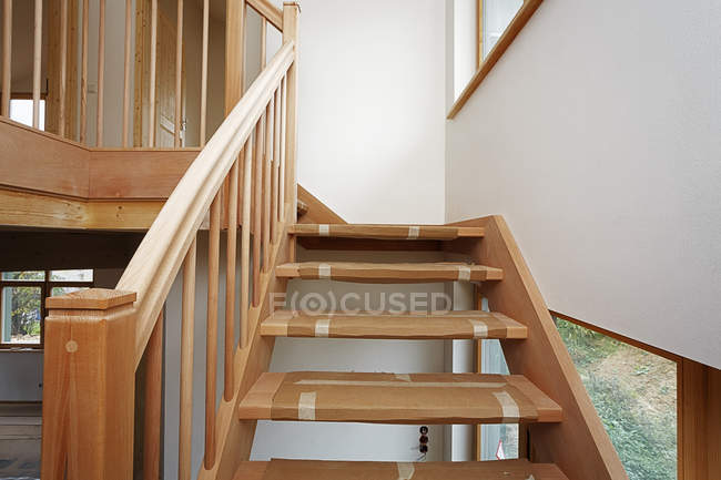 Stairway made of beech tree in new built one-family house — Stock Photo