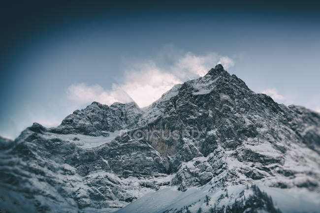 Austria, Tyrol, Karwendel, view to snow covered Spritzkarspitze — Stock Photo