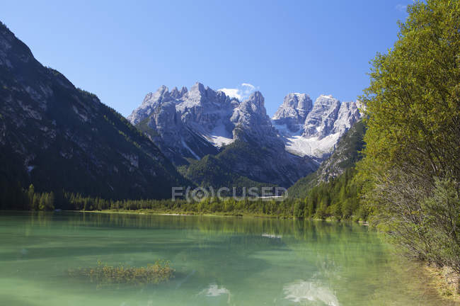 Italy South Tyrol Duerrensee And Monte Cristallo And View Of Rocks Over Lake Water Color Image Blue Sky Stock Photo 181951694