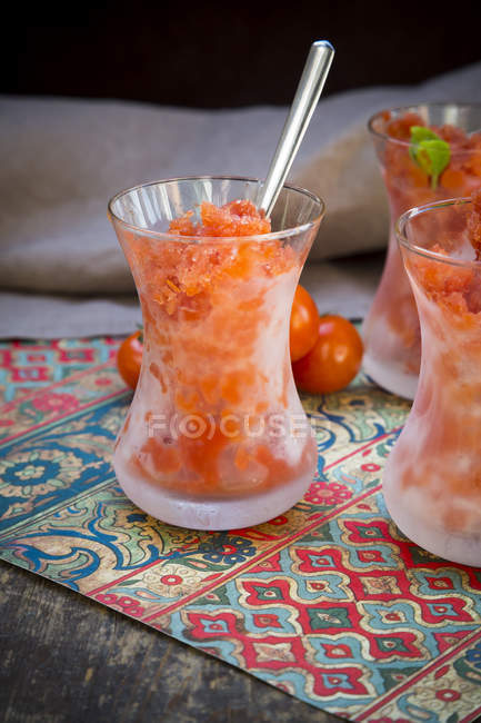 Glasses of tomato granita and cherry tomatoes — Stock Photo