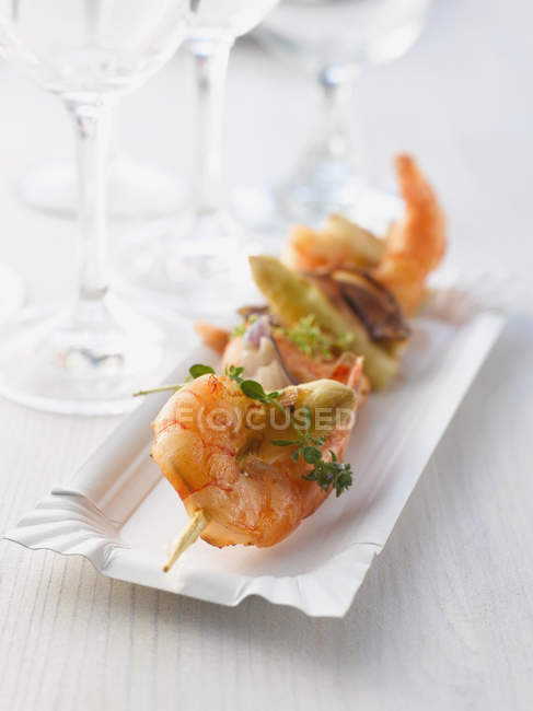 Prawn skewer with thyme — Stock Photo