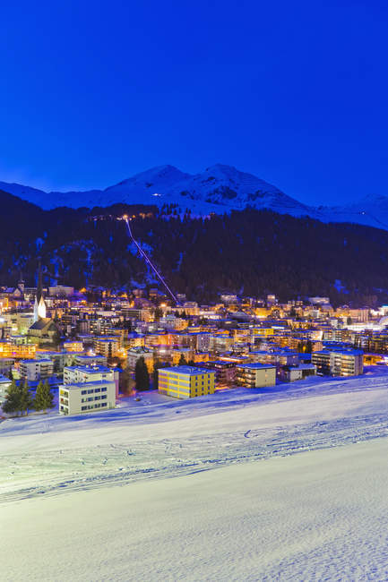 Switzerland, View of night city in mountains — Stock Photo