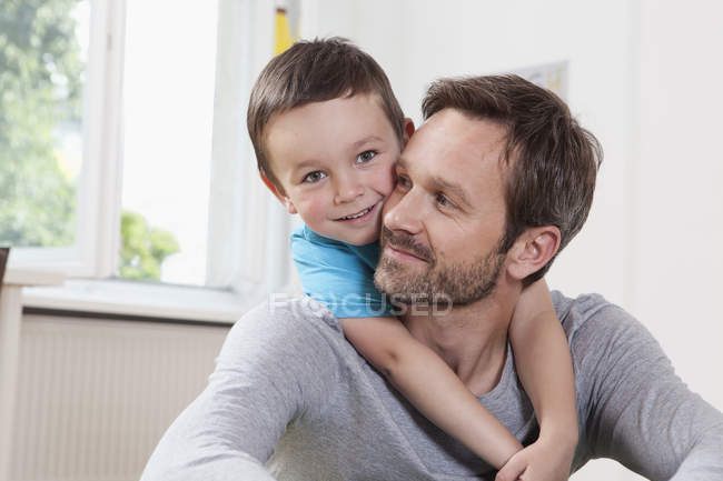 Father and son at home — Stock Photo