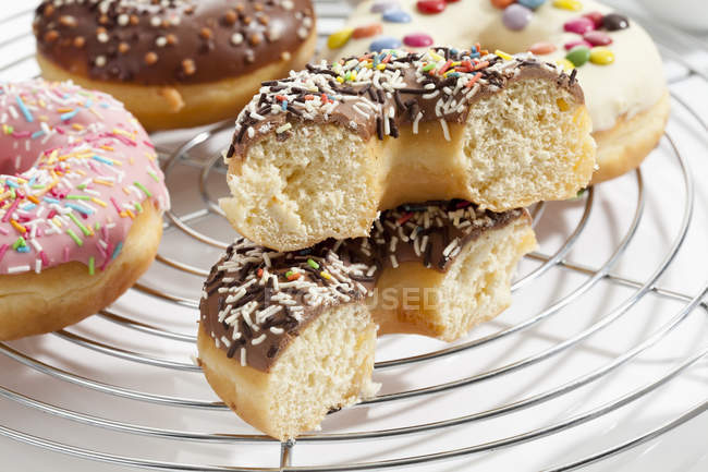 Halved doughnut topped with chocolate icing — Stock Photo