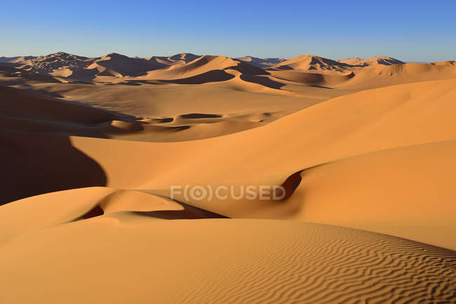 Scenic view of natural landscape with sand dunes of Sahara desert ...