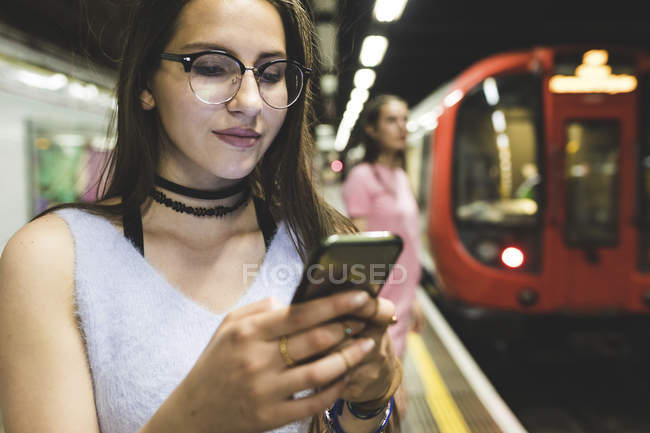 Subway old brunette glasses