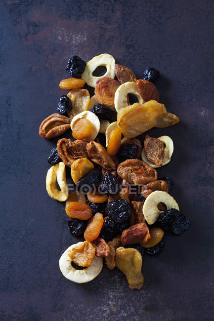 Tasty dried fruits on surface — Stock Photo