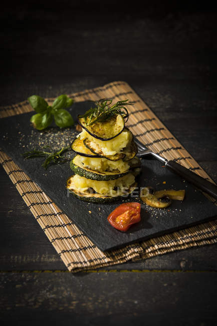 Vegan layered tower, potato mash, aubergine, zucchini and champignon — Stock Photo