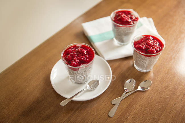 Chia pudding with rasberry topping on kitchen counter — Stock Photo