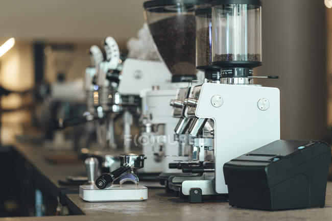 Espresso maker in a coffee bar — Stock Photo