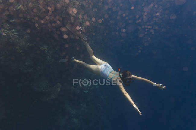Indonesia, Bali, young woman snorkeling — Stock Photo