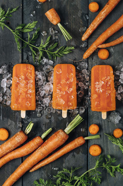 Close up of  Carrot ice popsicles — Stock Photo