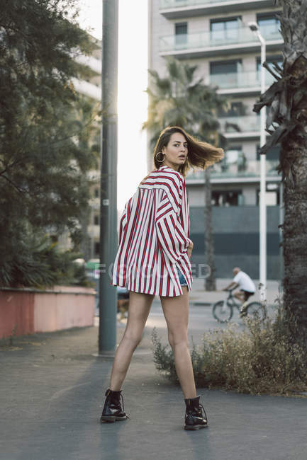 Portrait of woman wearing striped shirt — Stock Photo