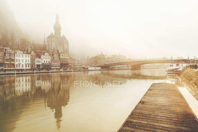Belgium, Dinant, cityscape with Meuse river at dawn — Stock Photo