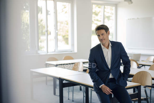 Businessman sitting in conference room — Stock Photo