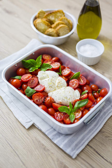 Italian food, caprese, mozzarella and tomatoes and basil — Stock Photo