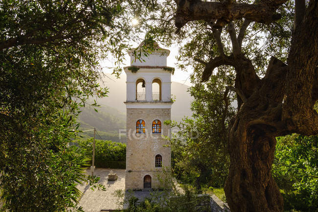 Albania, mountain village Himara, bell tower of the orthodox All Saints Church — Stock Photo