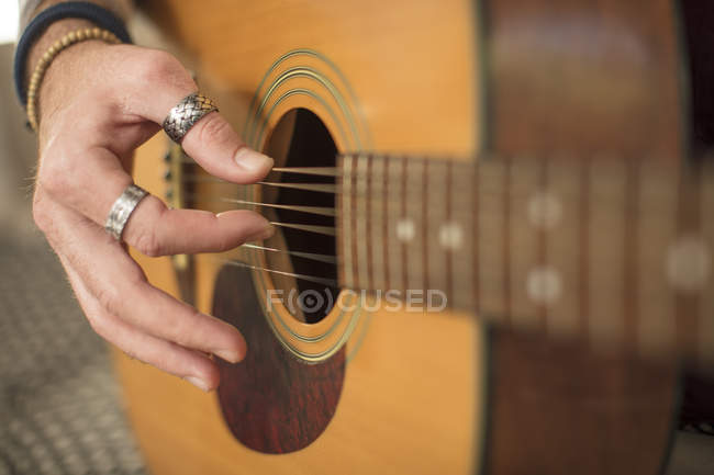 Close Up Of Man S Hand Playing Guitar Creativity Detail Stock Photo