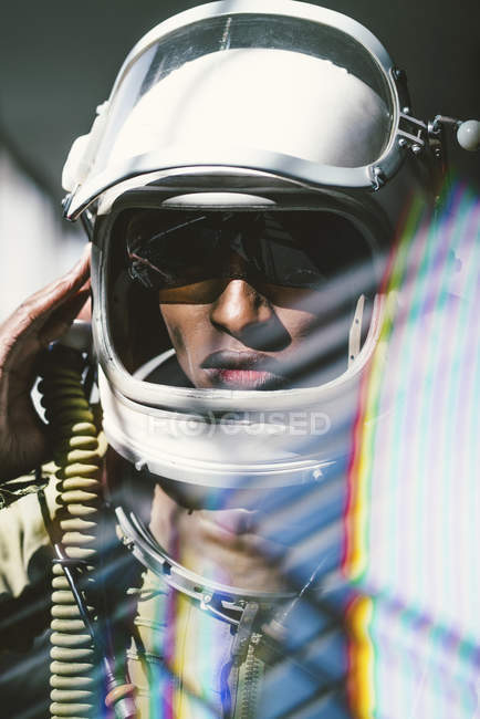 Portrait of serious astronaut in spacesuit — Stock Photo