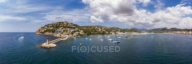Spain, Balearic Islands, Mallorca, Andratx Region, Aerial view of Port d 'Andratx, coast and natural harbour with lighthouse — стоковое фото