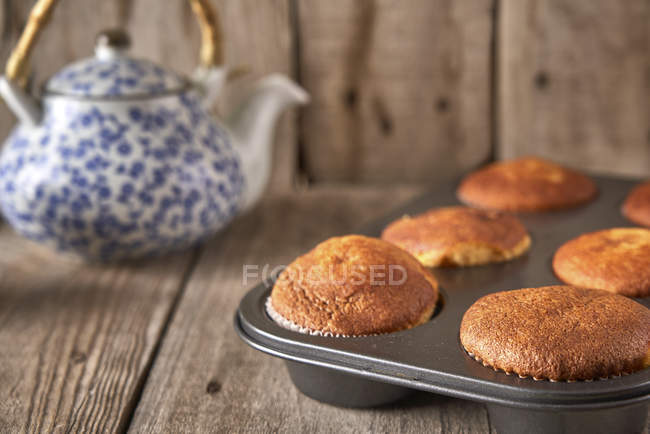 Tray with baked muffins — Stock Photo