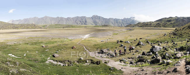 Russia, Caucasus, Mountaineers hiking in Upper Baksan Valley — Stock Photo