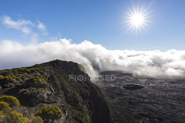 Reunion, Reunion National Park, Shield Volcano Piton de la Fournaise, View from Pas de Bellecombe against the sun — Stock Photo