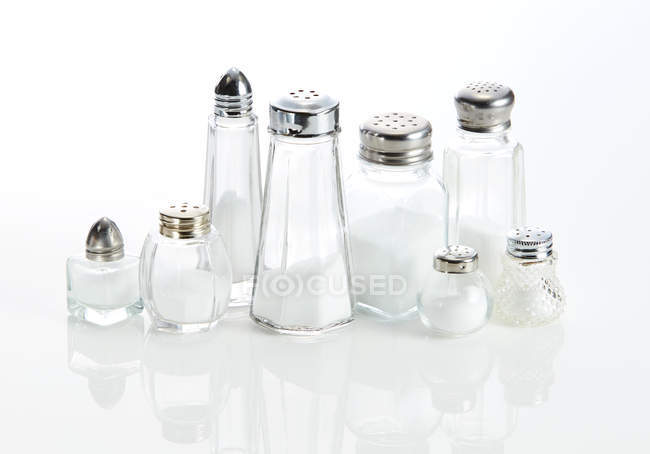 Otto vari shakjers sale invecchiano sfondo bianco — Foto stock