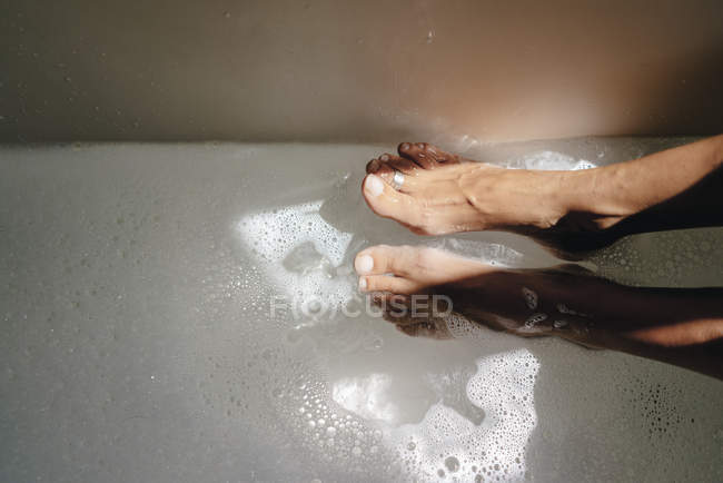 Woman taking footbath, partial view — Stock Photo