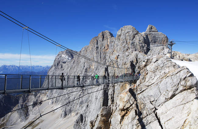 Austria, Styria, Salzkammergut, Dachstein massif, suspension bridge — Stock Photo