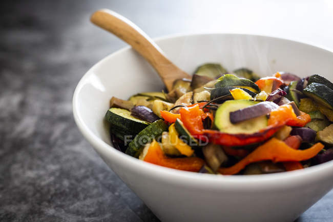 Mix of cooked vegetables in bowl — Stock Photo