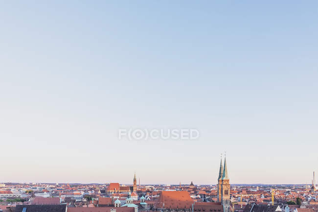 Germany, Nuremberg, Old town, Cityscape with St. Sebaldus Church, evening sky — Stock Photo