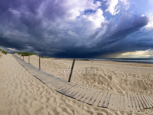 France, Contis-Plage, beach and dark clouds — Stock Photo