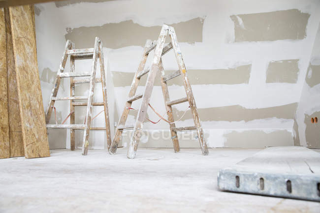 Two ladders in an attic to be renovated — Stock Photo
