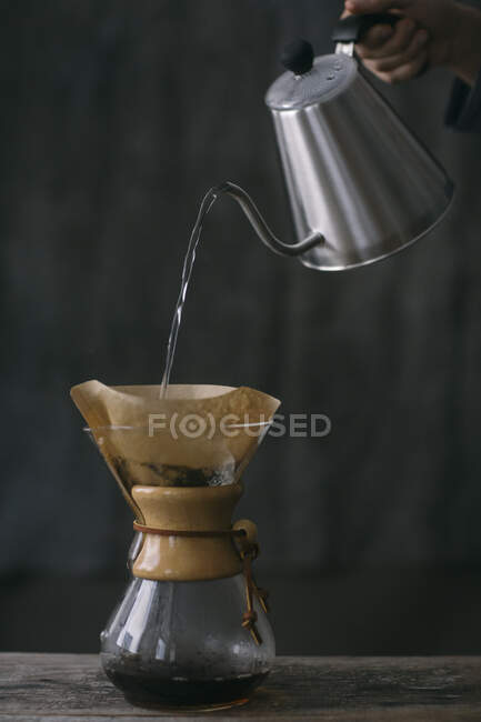 Close-up of man preparing filtered coffee — Stock Photo