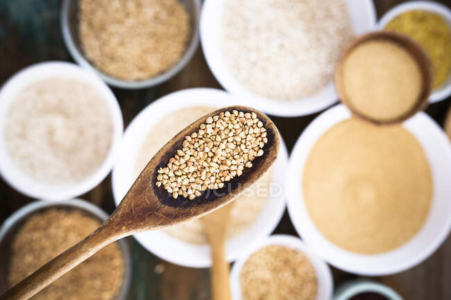 Buckwheat on spoon, close-up — Stock Photo