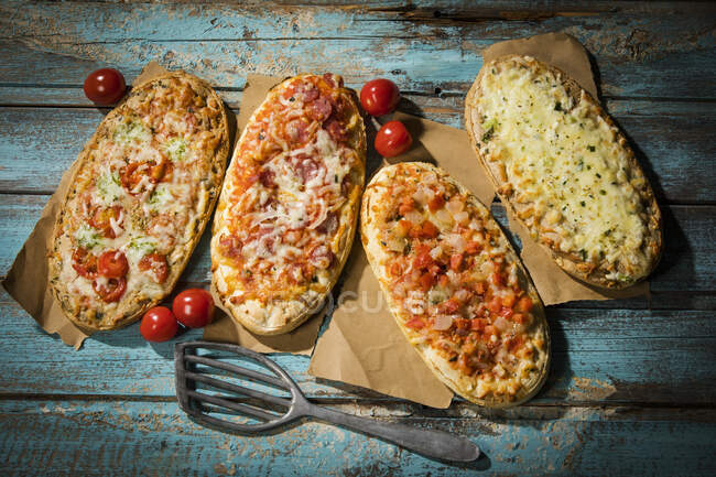 Closeup of Rustic pizza breads — Stock Photo