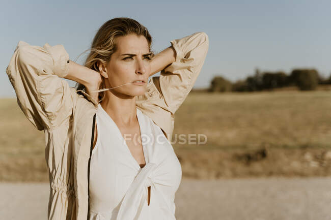 Portrait of female traveller with closed eyes — Stock Photo