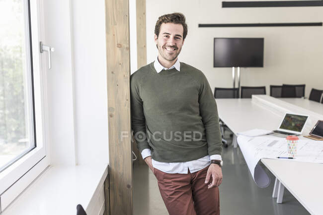 Successful, young businessman in boardroom — Stock Photo