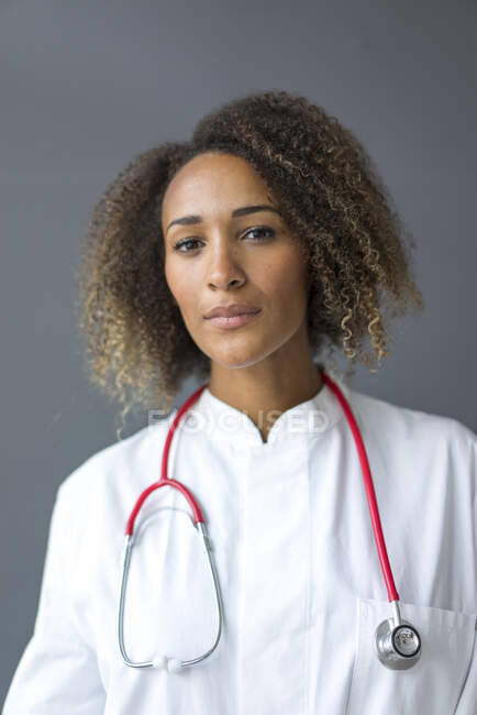 Portrait of young doctor with stethoscope — Stock Photo