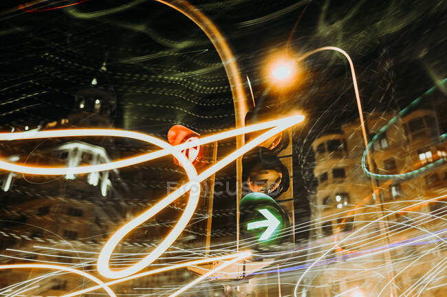 Traffic lights at luminous night in Madrid city, long exposure — Stock Photo