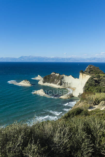Scenic view of Corfu against blue sky during sunny day, Ionian islands, Greece — Stock Photo