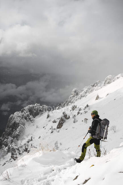 Mountaineer looking at distance, Italian Alps, Lecco, Lombardy, Italy — Stock Photo