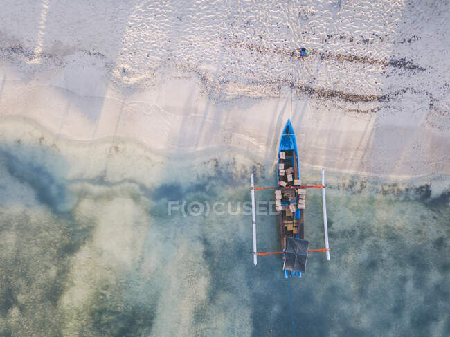 Drone shot of boxes in outrigger at Gili-Air Island, Bali, Indonesia — Stock Photo